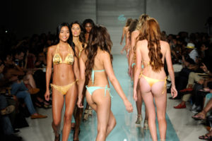MIAMI BEACH, FL - JULY 14: Modelsl walk the runway at Du Aqua Runway Show during Art Hearts Fashion Miami Swim Week Presented by AIDS Healthcare Foundation at Collins Park on July 14, 2016 in Miami Beach, Florida. (Photo by Arun Nevader/Getty Images for Art Hearts Fashion )