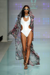 MIAMI BEACH, FL - JULY 14: A model walks the runway featuring L.A.M.B. By Gwen Stefani eyewear at Mister Triple X Runway Show during Art Hearts Fashion Miami Swim Week Presented by AIDS Healthcare Foundation at Collins Park on July 14, 2016 in Miami Beach, Florida. (Photo by Arun Nevader/Getty Images for Art Hearts Fashion)