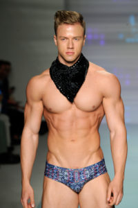 MIAMI BEACH, FL - JULY 14: A model walks the runway at Mister Triple X Runway Show during Art Hearts Fashion Miami Swim Week Presented by AIDS Healthcare Foundation at Collins Park on July 14, 2016 in Miami Beach, Florida. (Photo by Arun Nevader/Getty Images for Art Hearts Fashion)